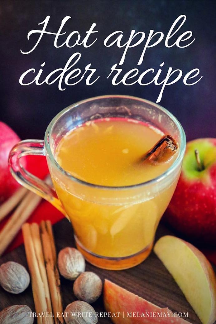 Hot Apple Cider recipe is mulled with cinnamon sticks, cloves and orange and spiked with a dash of Apple Brandy for an adult cider punch.